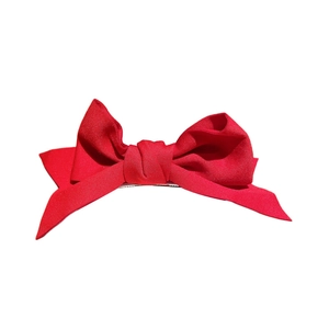 Chic red fabric bow hair clip featuring a classic double-wing design for daily hair styling