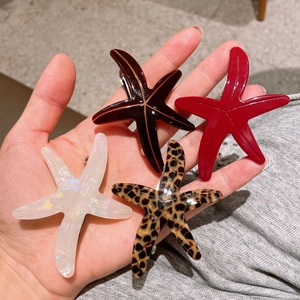 Lot de barrettes étoile de mer en acétate coloris blanc perle, écaille, rouge et léopard
