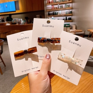 Lot de 3 barrettes à cheveux en acétate avec nœuds et pois sur cartes de présentation