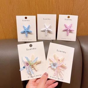 Set di fermagli per capelli a stella marina con fiori di stoffa e pizzo per mare