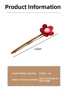 Dettaglio della clip per capelli in metallo da 12 cm con fiore rosso e centro rosa