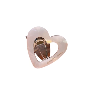 Elegant hollow heart acetate hair clip with white pearl and pink marble texture