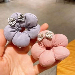 Sweet floral cotton bow scrunchies in lavender and soft pink for elegant girls