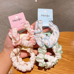 Floral print ruffled scrunchies set in pink blue green and brown cotton fabric