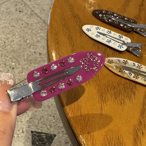 Floral marble pattern acetate hair clips set with rhinestones and glitter stars