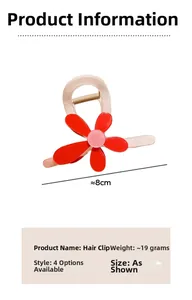 Détail d'une pince à cheveux tournesol rouge avec des dimensions de 8 cm et 19 g