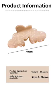 Macro detail of marble-textured heart hair claw clip with size measurements