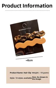 Detail view of wavy acetate hair clips in brown tortoiseshell and orange on display card
