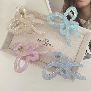 Elegant jelly-colored butterfly hair claws in macaroon tones for versatile hair styling