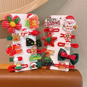 Set de 14 pinzas navideñas para el pelo de niños con renos y Papá Noel