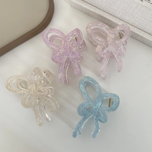 Jelly color butterfly hair claws in purple pink white and blue with marble texture