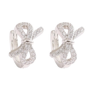 Elegant silver bow earrings with sparkling crystals for a sophisticated minimalist look