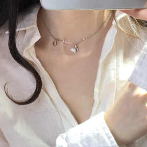 Detailed view of S925 sterling silver butterfly pendants with delicate hollow craftsmanship