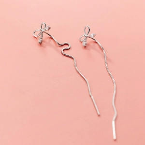 Élégantes boucles d'oreilles nœud papillon en argent S925 avec cristaux scintillants