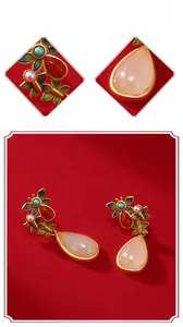Detail of silver drop earrings with Hetian jade, cloisonne butterfly and enamel work
