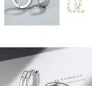 Vue détaillée des boucles d'oreilles créoles S925 argent à double couche avec fini poli