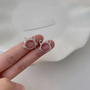 Close-up of S925 sterling silver cat-shaped hoop earrings with minimalist hollow ear design