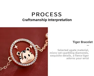 Macro shot of rose gold tiger bracelet with red agate and shimmering micro-set diamonds