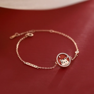 Zodiac Tiger lucky charm bracelet in rose gold with sparkling rhinestones and red enamel inlay