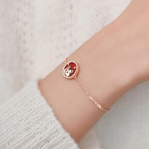 Rose gold tiger bracelet with red enamel pendant and lucky tag for women