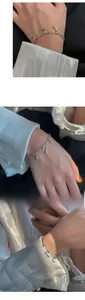 Détails de charms métalliques irréguliers style lave sur un bracelet à maillons poli