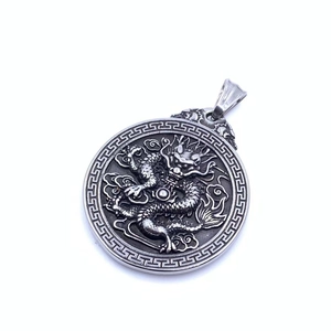 Vintage stainless steel dragon pendant necklace featuring intricate embossed round medallion
