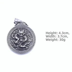 Relief dragon pendant in stainless steel with retro ethnic patterns and circular design