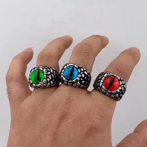 Vintage steel rings with devil's eye stone and embossed scale texture in three colors