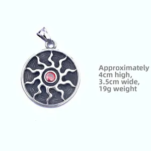Macro detail of vintage sunflower pendant with red rhinestone inlay and size specifications
