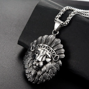 Vintage steel lion head pendant with Indian feathered headdress on silver rope chain