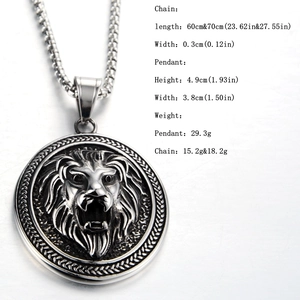 Detailed view of lion head pendant with grain border and specific size measurements