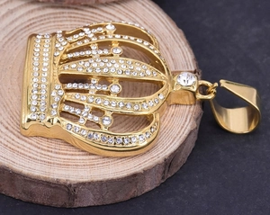 Hip hop style gold plated crown pendant with shimmering micro pave cubic zirconia stones