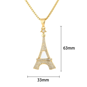 Vue détaillée du pendentif Tour Eiffel de 63mm x 33mm orné de strass brillants et doré