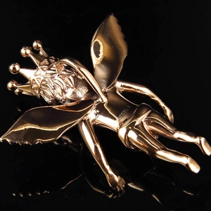 Classic vintage gold plated stainless steel angel pendant featuring wings and crown