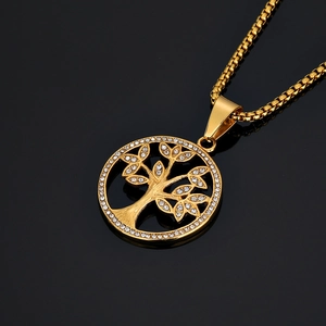 Golden Tree of Life pendant necklace with pavé crystal accents on a box chain