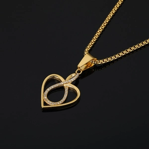 Gold plated heart pendant necklace with infinity symbol and pave crystals on box chain