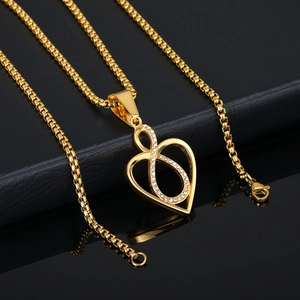 Elegant gold heart infinity pendant necklace with cubic zirconia on a sleek box chain