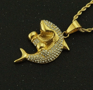 Hip hop shark pendant necklace with sparkling cubic zirconia on a gold twist rope chain
