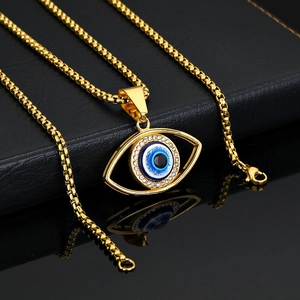 Gold plated stainless steel evil eye necklace with white zircon on black leather box