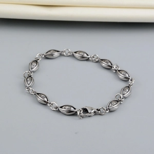 Vintage evil eye bracelet in antique silver finish with detailed embossed link pattern