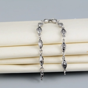Retro hip hop evil eye bracelet in silver steel with vintage oxidized shuttle links