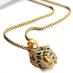 Pendentif tête de léopard doré style hip-hop avec yeux verts et cristaux brillants