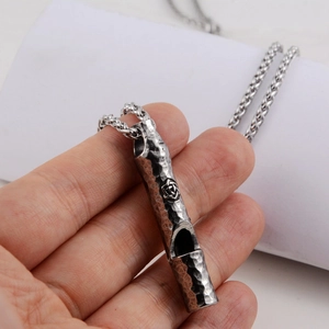 Retro whistle pendant necklace in hammered stainless steel with a rose engraving detail