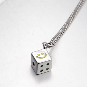 Titanium steel necklace featuring a silver cube dice pendant with a yellow smiley face