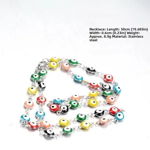 Macro shot of colorful enamel evil eye beads on a durable stainless steel link chain