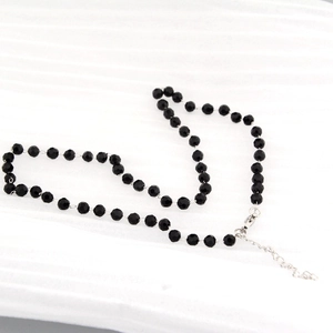 Minimalist black faceted bead necklace with silver lobster clasp and adjustable chain