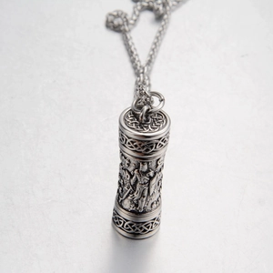 Detailed relief of Celtic knots and warrior on silver cylinder perfume pendant