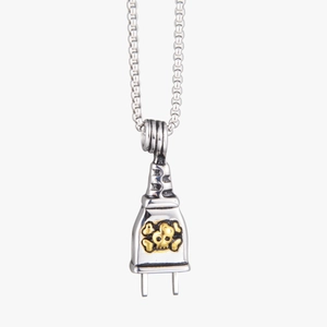 Skull plug pendant necklace in punk style with silver finish and gold skull detailing