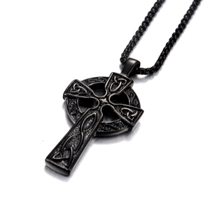 Detailed side view of matte black stainless steel Celtic knot cross pendant with bead chain