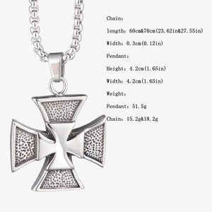 Close-up of metal iron cross pendant featuring textured arms and polished steel center